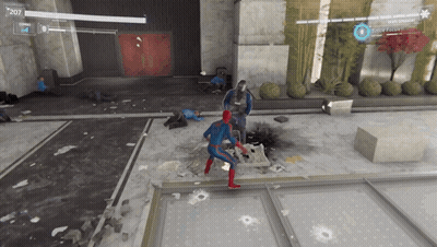 A Video Game Shows A Spider Man Fighting A Group Of Men GIF