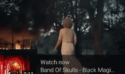 A Video Of A Burning Building With The Words Watch Now Band Of Skulls GIF