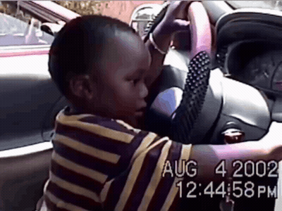 A Video Of A Child Driving A Car Was Taken On Aug 4 2002 At 12:34:58 Pm GIF