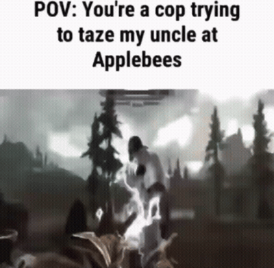 A Video Of A Cop Trying To Taze An Uncle At Applebees . GIF