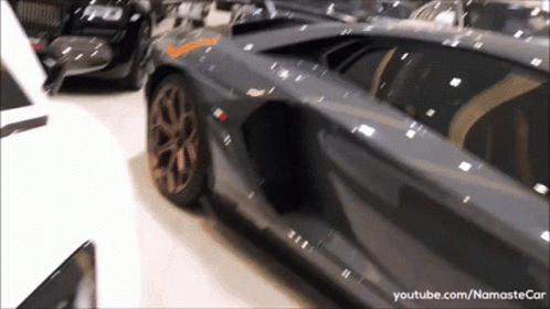 A Video Of A Lamborghini Aventador Is On Youtube.com GIF