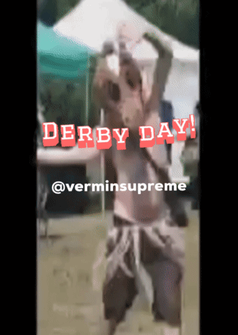 A Video Of A Man In A Horse Mask With The Words Derby Day In Red GIF