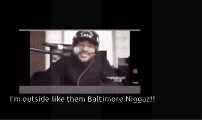 A Video Of A Man Talking Into A Microphone With The Words I 'M Outside Like Them Baltimore Niggaz GIF