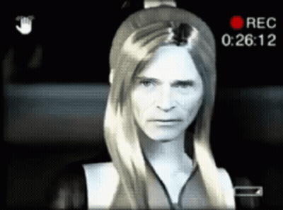 A Video Of A Man With Long Hair Is Being Recorded At 0 : 26 : 12 GIF