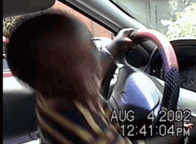 A Video Of A Person Driving A Car With Aug 4 2002 At The Bottom GIF