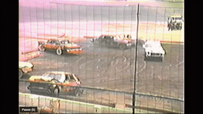 A Video Of A Race With A Pause Button GIF