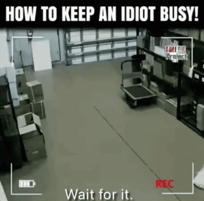 A Video Of A Warehouse With The Words " How To Keep An Idiot Busy " At The Top GIF