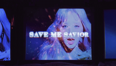 A Video Of A Woman With The Words Save Me Savior On It GIF