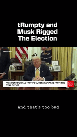 A Video Of Donald Trump Sitting At A Desk GIF