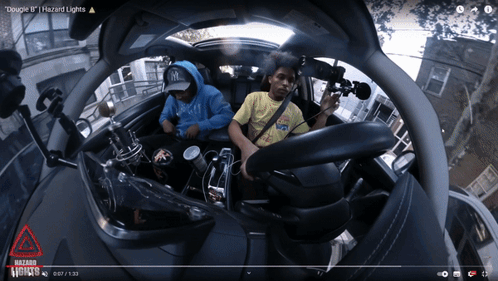 A Video Of Two People In A Car Is Titled Google I Hazard Lights GIF