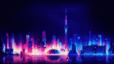 A View Of A City Skyline Through A Window With Rain Drops On It GIF