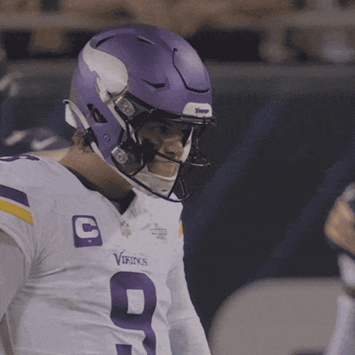 A Vikings Player Wears A Purple Helmet GIF