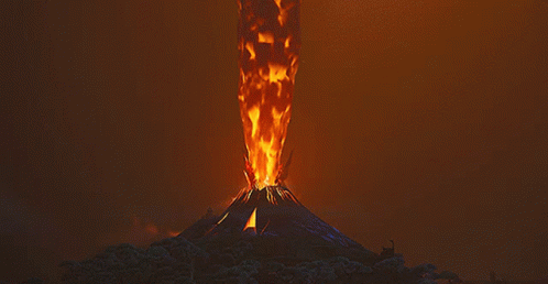 A Volcano With Flames Coming Out Of It 'S Mouth GIF
