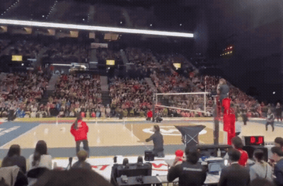 A Volleyball Game Is Being Played In A Stadium GIF