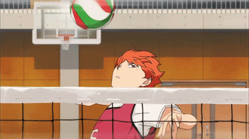 A Volleyball Player In A Red Jersey With The Letter T On It GIF