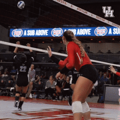 A Volleyball Player In A Red Jersey With The Number 22 On It GIF