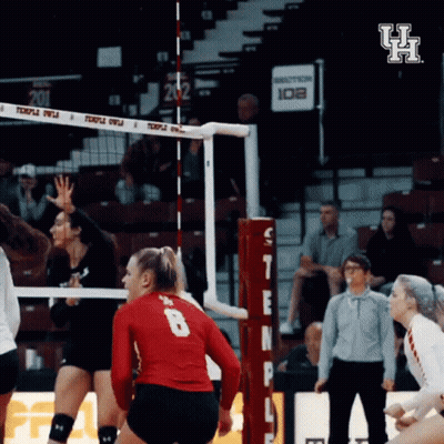 A Volleyball Player Wearing A Red Jersey With The Number 8 On The Back GIF