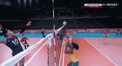 A Volleyball Player With The Number 10 On Her Jersey GIF