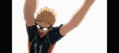 A Volleyball Player With The Number 11 On His Jersey Is Jumping In The Air With His Arms In The Air . GIF