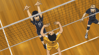 A Volleyball Player With The Number 11 On The Back Of His Shirt GIF