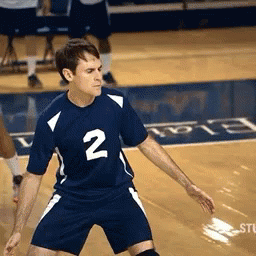A Volleyball Player With The Number 2 On His Shirt GIF