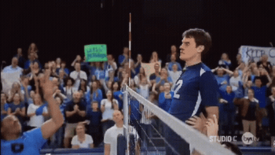 A Volleyball Player With The Number 2 On The Back Of His Shirt GIF