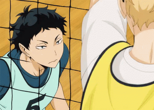 A Volleyball Player With The Number 6 On His Jersey Stands Next To Another Player GIF