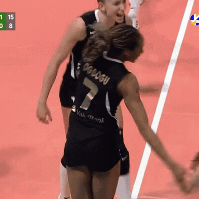A Volleyball Player With The Number 7 On Her Jersey GIF