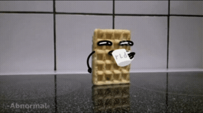 A Waffle With Arms And Legs Is Holding A Piece Of Paper With The Word Rid On It GIF
