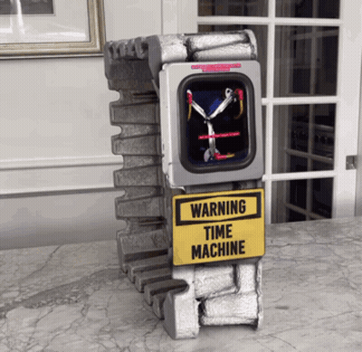 A Warning Time Machine Is Sitting On A Marble Counter GIF