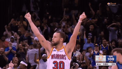 A Warriors Basketball Player Celebrates In Front Of The Crowd GIF