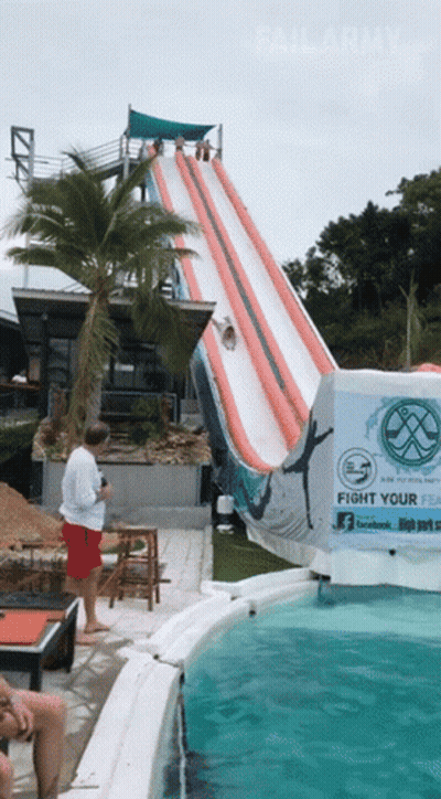 A Water Slide With A Sign That Says " Fight Your Fear " GIF