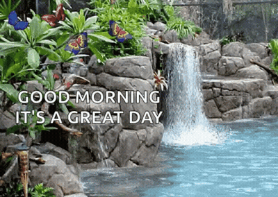 A Waterfall In A Garden With The Words `` Good Morning It 'S A Great Day '' . GIF