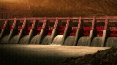 A Waterfall Is Coming Down The Side Of A Dam With Chinese Writing On It GIF