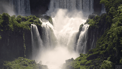 A Waterfall With Drbo Written On The Bottom Of The Image GIF