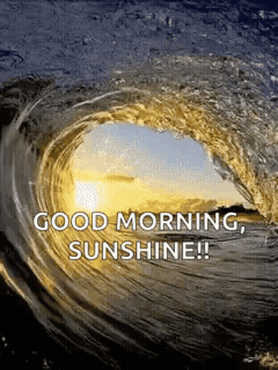 A Wave In The Ocean With The Words `` Good Morning Sunshine '' Written On It . GIF