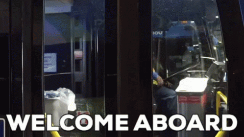 A Welcome Aboard Sign Is Displayed On A Bus GIF