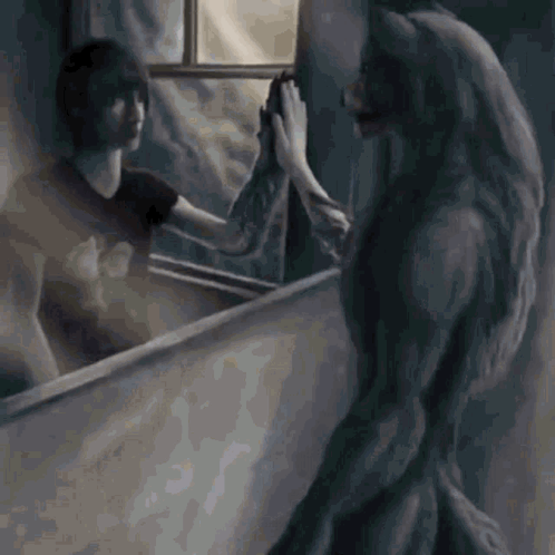 A Werewolf Is Standing In Front Of A Mirror Looking At Her Reflection GIF