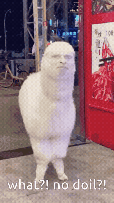 A White Alpaca With A Man 'S Face Is Standing In Front Of A Red Door With The Words What No Doil GIF