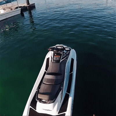 A White And Black Jet Ski With The Word Yamaha On It GIF