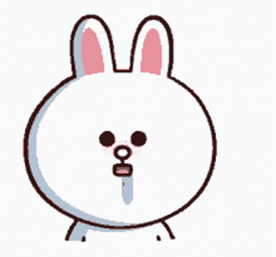 A White Bunny With Pink Ears And Black Eyes Looks At The Camera GIF