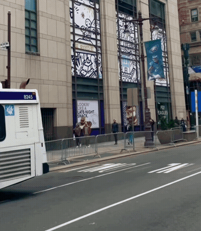 A White Bus With The Number 8245 On The Back GIF
