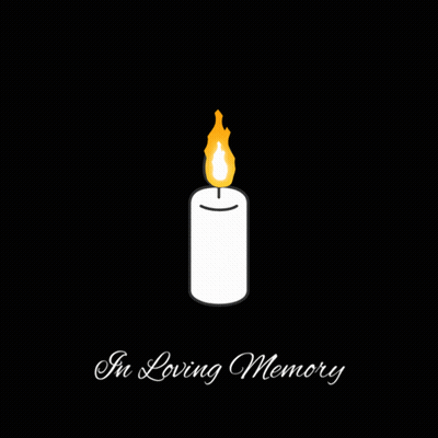 A White Candle With The Words In Loving Memory Written Below It GIF