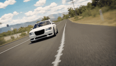 A White Car Is Driving Down A Country Road GIF