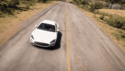 A White Car Is Driving Down A Road With Trees In The Background GIF