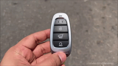 A White Car Is Driving Down A Street With A License Plate That Says ' Shree Ram ' On It GIF