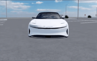 A White Car Is Parked In A Parking Lot With A Blue Sky In The Background GIF