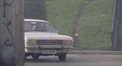 A White Car With 4875 Ar 92 On The Front License Plate GIF