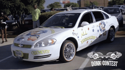 A White Car With A License Plate That Says ' Crunchy ' On It GIF