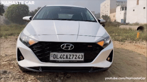 A White Car With A License Plate That Says Dl4cazz243 GIF